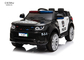 L'automobile elettrica dei bambini, volante della polizia a quattro ruote di SUV